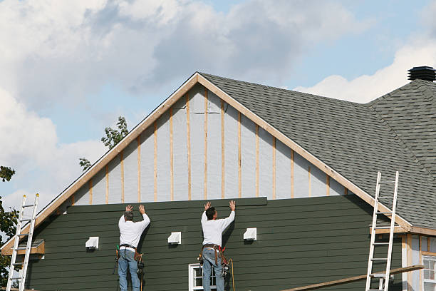 Professional Siding technician working in Avon, OH